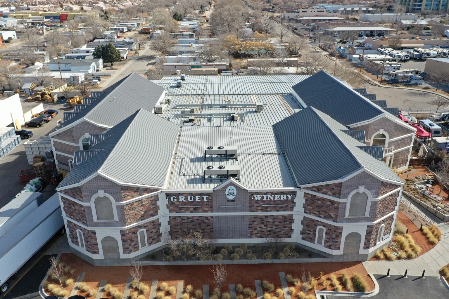 Aerial view of Gruet Winery and its completed metal roof